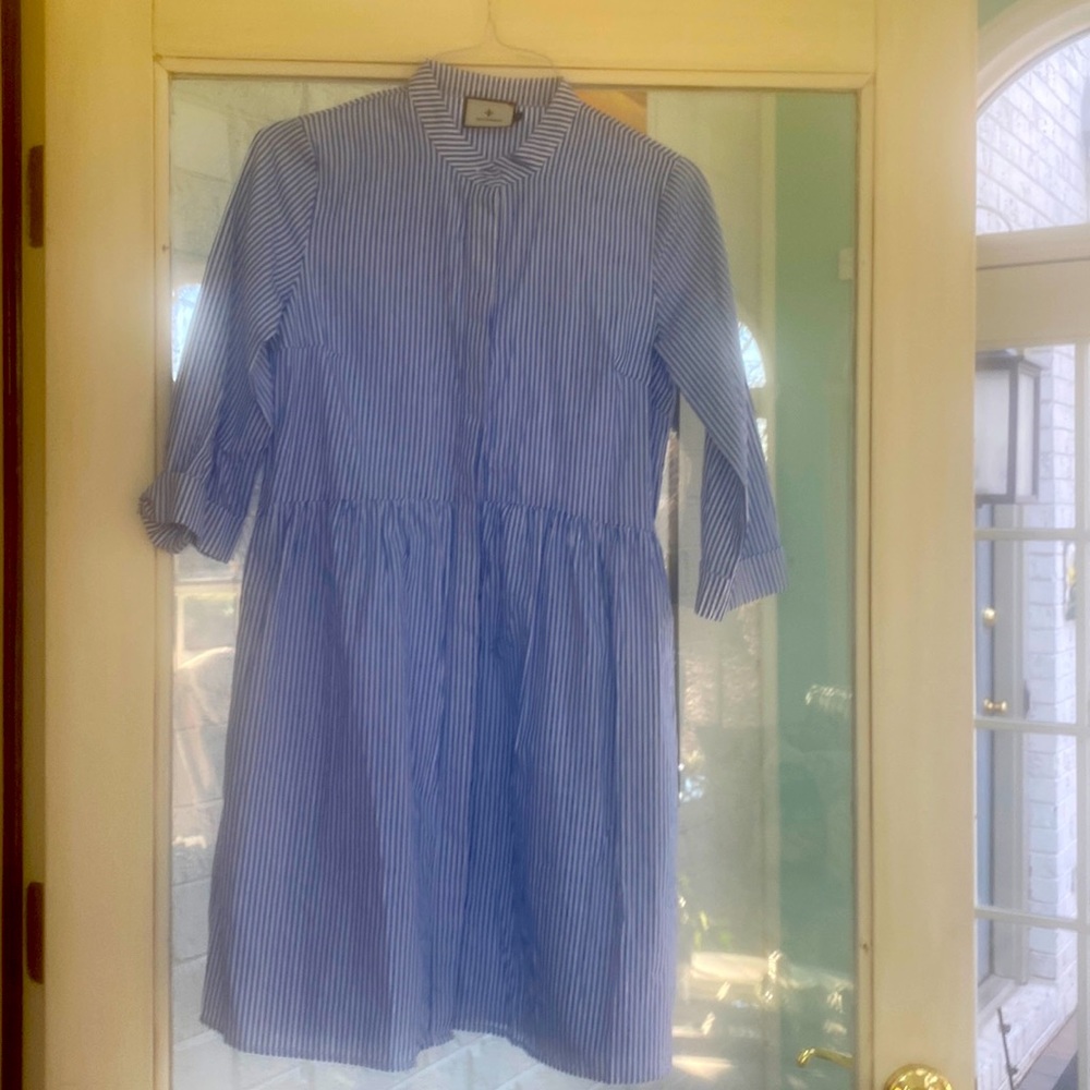 The Blue Sleeveless Royal Shirt Dress by Tuckernuck can go anywhere. Never worn
